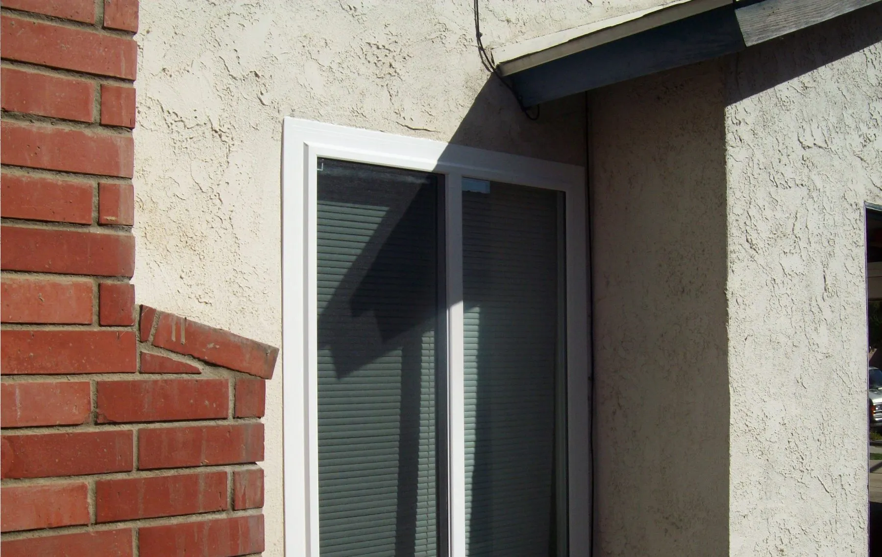 After: a bedroom window before and after replacement