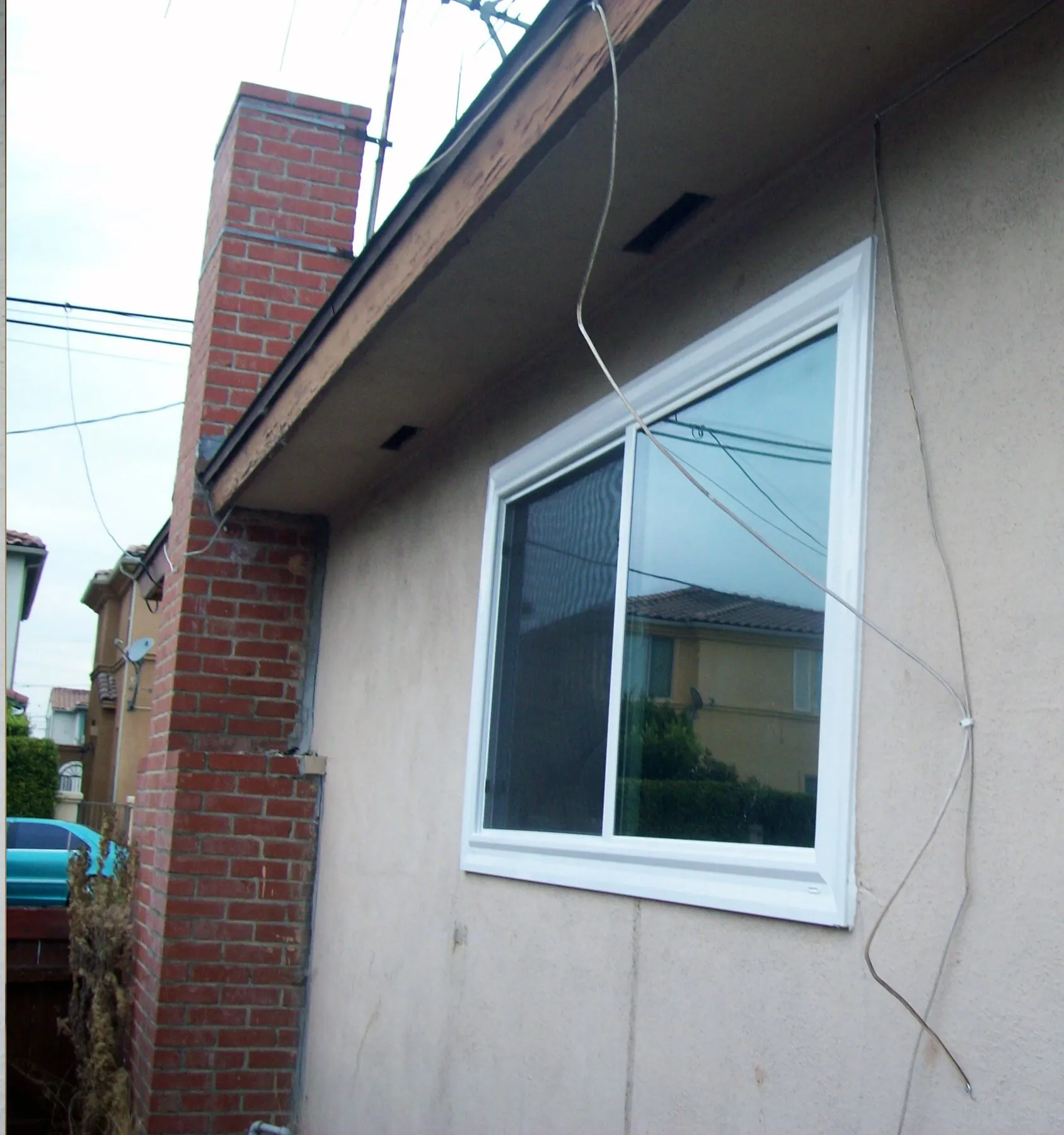 After: a corner sliding glass door before and after replacement